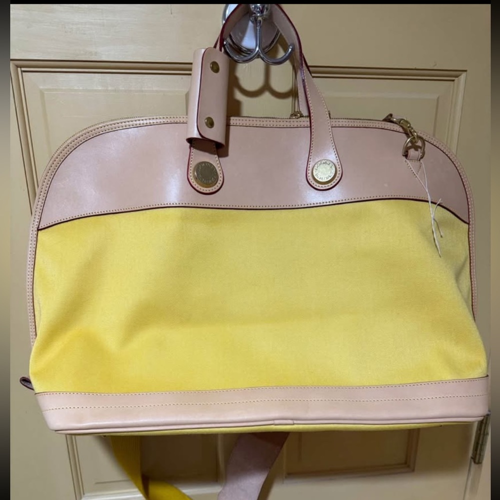 Dooney and Bourke, yellow canvas, leather travel bag